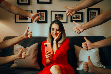 Attractive Woman Enjoying g all the Attention on Social Media. Happy online influencer getting...