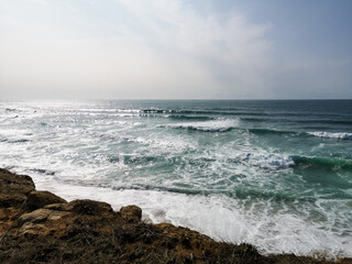 Powerful Ocean Waves Crashing on Rocky Cliffs