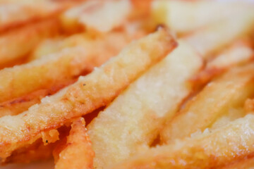 photo of delicious french fries or french fries fresh potatoes fried color potato background