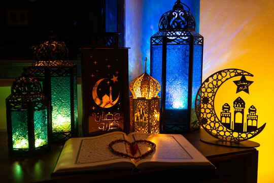 Praying Woman in front of Colorful Ramadan Lanterns, Rosary Beads and Quran (Quran) Ramadan Month Background Photo, Üsküdar Istanbul, Turkiye (Turkey)