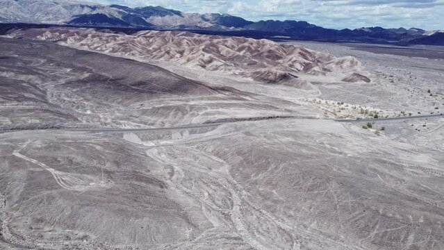 Scenic mountainscape aerial shot of the Nazca desert in Peru. Nazca lines.