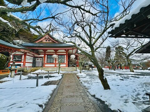 The Kuramadera Temple at Kyoto, Japan after a hiking trail in the snowy forest on a winter day