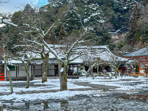 The Kuramadera Temple at Kyoto, Japan after a hiking trail in the snowy forest on a winter day