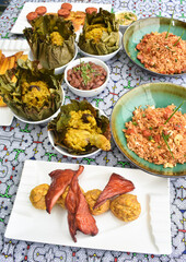 Amazonian round: Juanes, typical Amazonian food in banana leaves. Typical jungle food with rice, chicken and dresses. Peruvian food