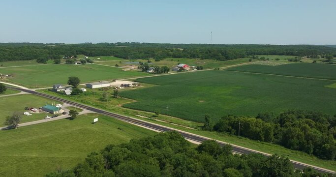 Flying over crop fields lakes farmland midwest kansas
