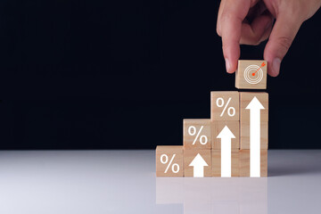 Interest rate and dividend concept. Businessman with percentage symbol and up arrow, 2024, Interest rates continue to increase, return on stocks and mutual funds, long term investment for retirement.