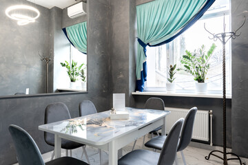 Interior of light colored canteen at the business center