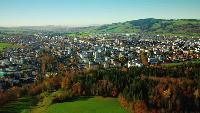 Aerial Panorama Of Late Autumn Nature Over Bulle Town In Canton Of Fribourg In Switzerland.