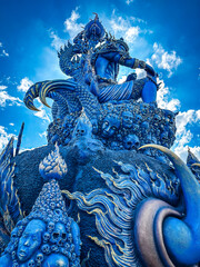 Blue Temple or Wat Rong Suea Ten, in Chiang Rai, Thailand - obrazy, fototapety, plakaty