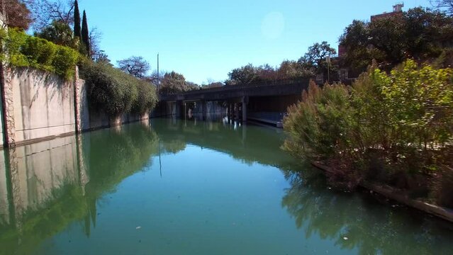Aerial: Drone Backward Scenic Shot Of Bridge Against Clear Sky On Sunny Day - San Antonio, Texas