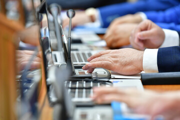 close up of a person working on a computer
