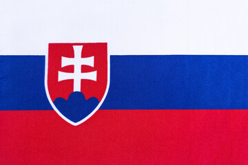 the national flag of Slovakia on a fabric basis in close-up