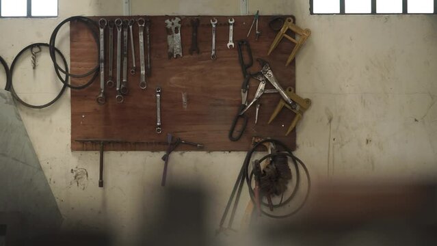 factory tools hanging on the wall