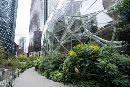 Seattle, WA, USA - Oct 24, 2023: The footpath outside of the Spheres, three intersecting spherical conservatories comprising part of the Amazon headquarters campus in Seattle, Washington.