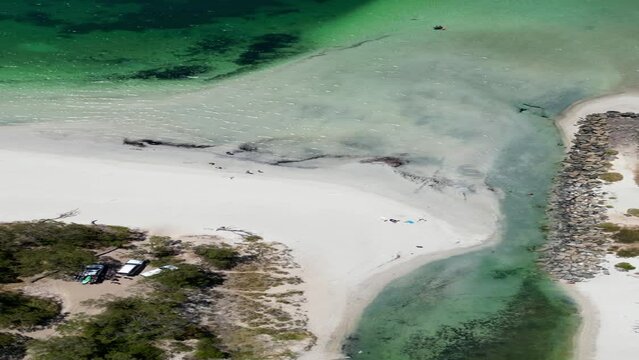 Drone footage of the mouth of Busselton seasonal lake and the stone pier in Abby Beach, Australia