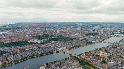 Fototapeta na wymiar Copenhagen, Denmark. Copernhagen lakes. Panorama of the city center in cloudy weather. Summer day, Aerial View