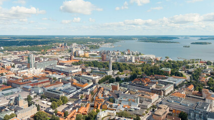 Fototapeta na wymiar Vasteras, Sweden. Panorama of the city with the town hall and Lake Malaren. Summer day, Aerial View