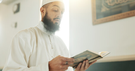 Quran, Muslim and man reading for faith in a mosque for praying, peace and spiritual care in holy...