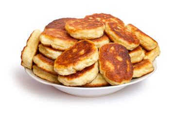 Plate with homemade pancakes on white background. Pile of pancakes in plate isolated on white background.