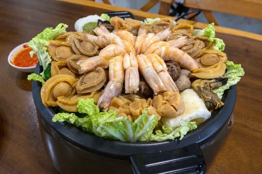 Poon Choi or Pen Cai, traditional Cantonese dish comprised of a number of ingredients for Chinese New Year