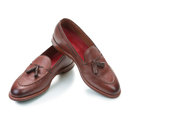 Two Traditional Formal Stylish Brown Pebble Grain Tassel Loafer Shoes On White