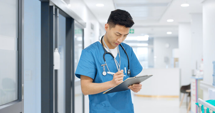 Doctor, planning and writing in documents, medical checklist or charts for hospital notes or clinic service. Healthcare worker, asian man or nurse smile for clipboard, paperwork or thinking in clinic