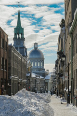 Massive snow and ice in downtown Montreal Montréal Quebec, Canada on sunny day with blue sky...