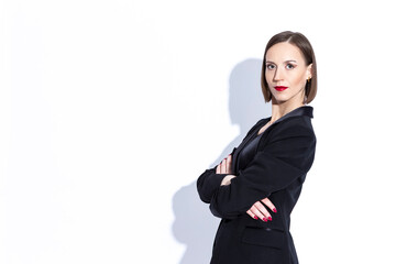 Successful Women In Business. Portrait of Winsome Positive Confident Caucasian Business Woman in Black Suit Posing Over White