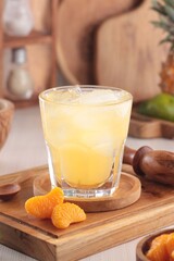fresh orange juice with ice cubes
