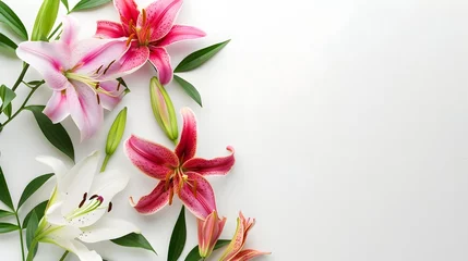Möbelaufkleber Beautiful lily flowers on white background, flat lay. Space for text  © PSCL RDL