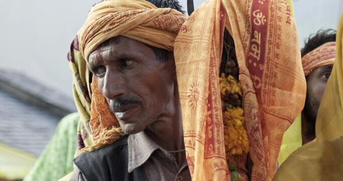Man Standing in a que outside Shiva Temple in Chaurasi Temple Bharmour Himachal Pradesh India