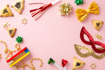Top view snapshot of Purim festivities, displaying triangle cookies, Star of David, festive gear...