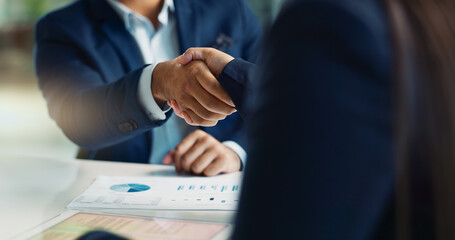 Business people, negotiation and handshake for deal, agreement or partnership in office. Shaking...