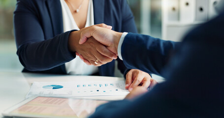 Business people, closeup and handshake for deal, agreement and partnership negotiation in office....