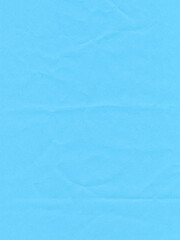 Surface of colored paper, sheet of crumpled light blue paper