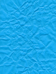 Surface of colored paper, sheet of crumpled blue paper - 733657972