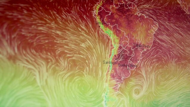 Temperatures winds over South America Brazil South Atlantic. Pixels visible. Moving camera shot of a computer screen. Weather wind satellite view map. Precipitations, temperature, air pressure. 
