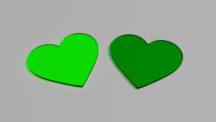 Dwa szklane zielone serca na szarym tle © Greg [RenderMania]