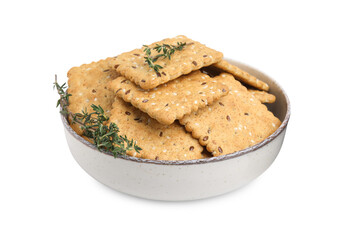 Cereal crackers with flax, sesame seeds and thyme in bowl isolated on white