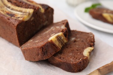 Delicious homemade banana bread on table, closeup