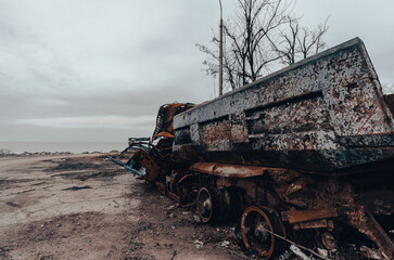 burnt cars and destroyed buildings of the workshop of the Azovstal plant in Mariupol