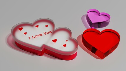 Dwa białe serca w transparentnym pudełku czerwone różowe szklane serca na szarym tle i love you