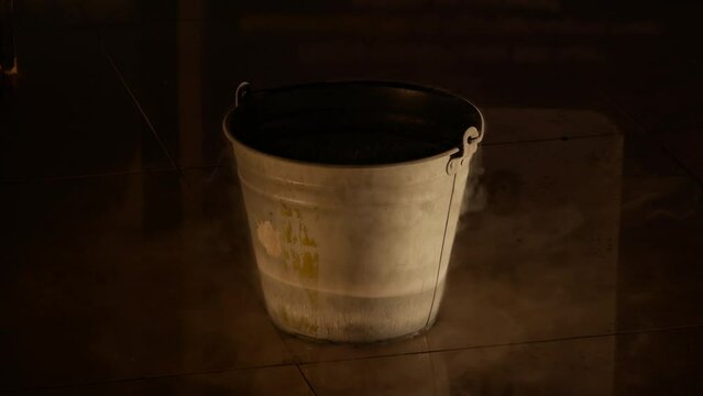 Bucket of liquid helium and nitrogen. Preparing for extreme overclocking of the CPU or GPU processor. World record of chip performance. 12 gigahertz (GHz)
