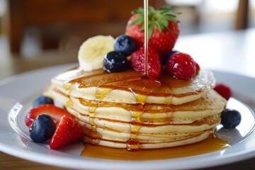 Fluffy Homemade Pancakes Topped With Sweet Fruits And Syrup, Ready To Devour