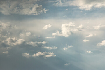 small white clouds on the blue sky.