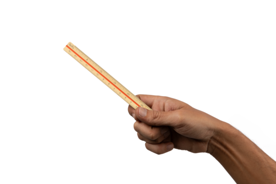 Black male hand holding a vintage or antique ruler isolated no background