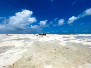 Extremely low tide on the sand beach