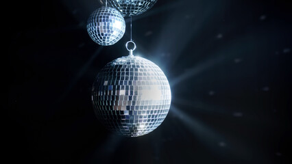 A colorful disco mirror ball illuminates the backdrop of a nightclub. The party lights up the disco ball.