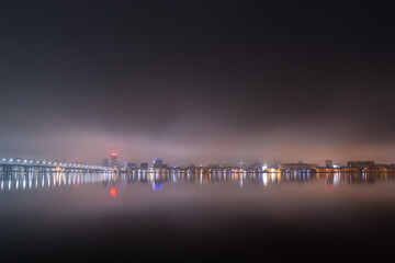 Scenic view of the city of Dnepr in the winter evening. Dnipro in the evening. Ukrainian city in...