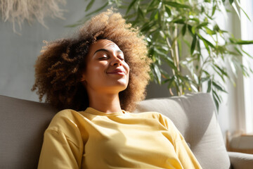Young woman enjoying a peaceful moment in sunlit room
